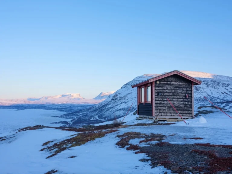 Cabin in snow on mountain