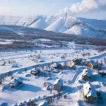Aerial winter view of Kiruna, the northernmost town in Sweden, province of Lapland, winter sunny picture shot from drone